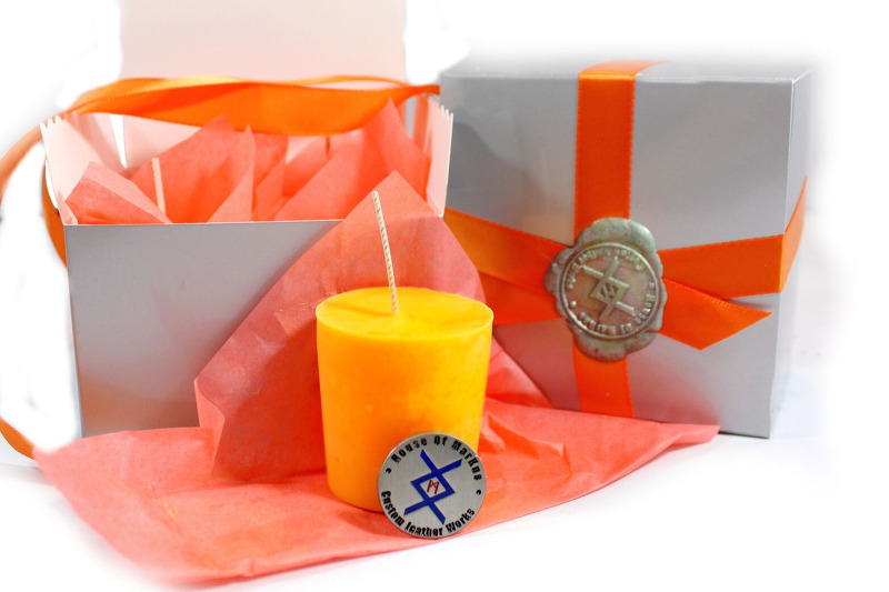 Low temperature unscented orange votive play candles by House of Markus
