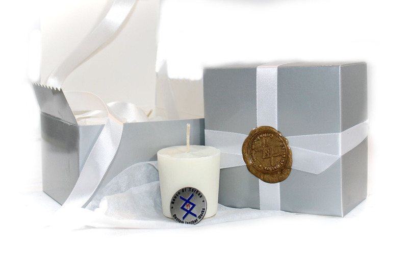 Low temperature leather scented white votive play candles by House of Markus