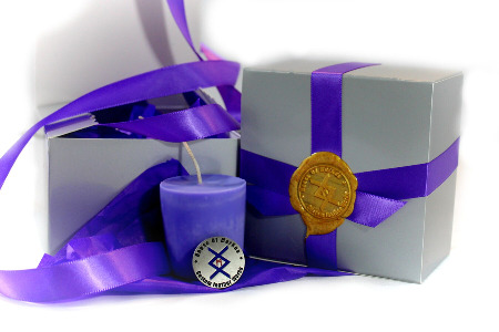 Low temperature leather scented purple votive play candles by House of Markus